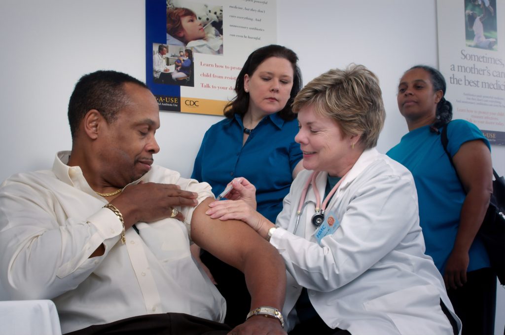cdc vaccine being given in healthcare setting