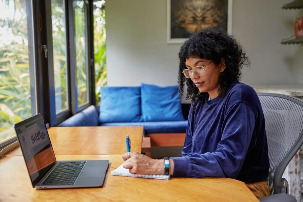 Employee working remotely on a laptop at home